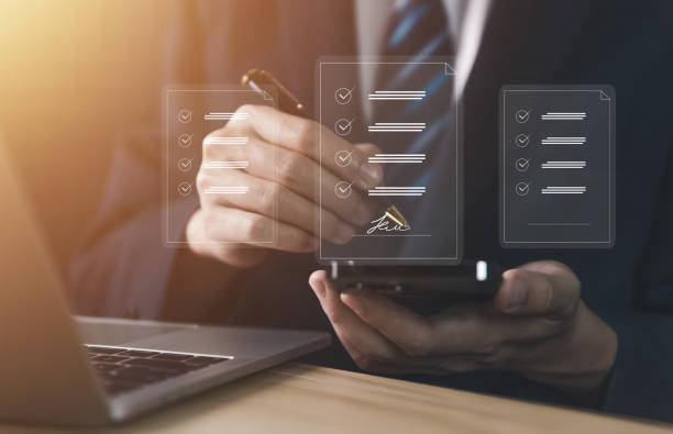 istock Businessman signing electronic smart contract on smartphone 1463357373