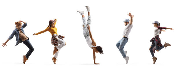 istock African american guy performing a handstand and other people dancing 1463359879