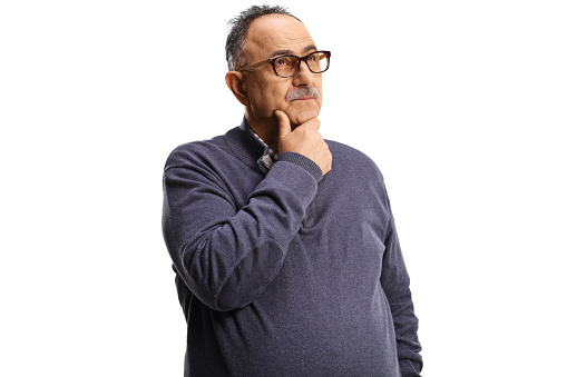 Mature man holding his chin and thinking isolated on white background