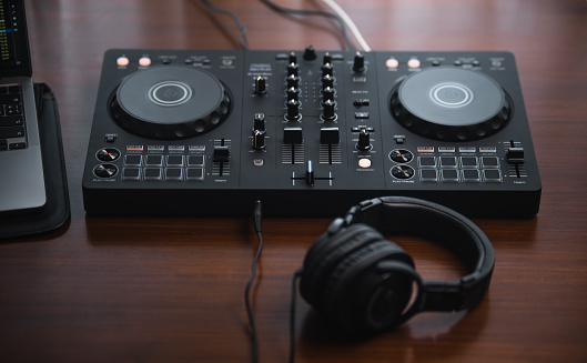 dj controller and Sound mixing desk at home,headphone