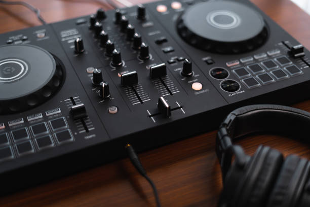 istock Close-up  dj controller and Sound mixing desk at home 1463362137