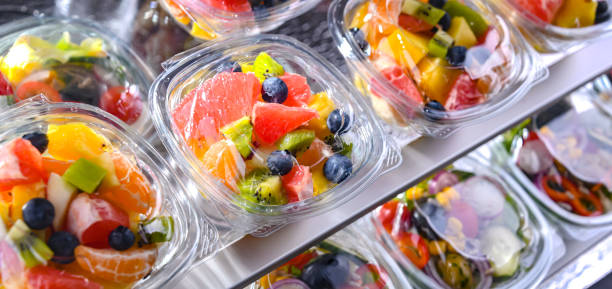 istock Boxes with pre-packaged fruit salads in a commercial fridge 1463363629