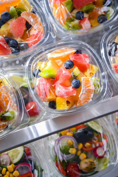 istock Boxes with pre-packaged fruit salads in a commercial fridge 1463363646