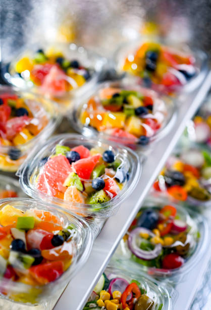 istock Boxes with pre-packaged fruit salads in a commercial fridge 1463363655