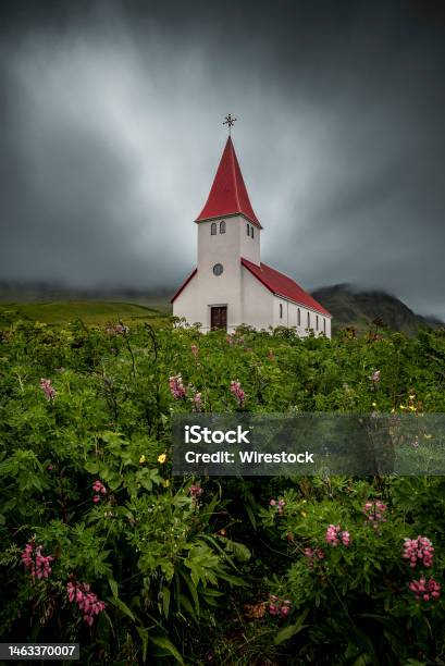 Vertical Shot Of Reyniskirkja Church Vik Iceland Stock Photo - Download Image Now