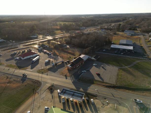 istock Aerial view of a road with small building around it 1463371629