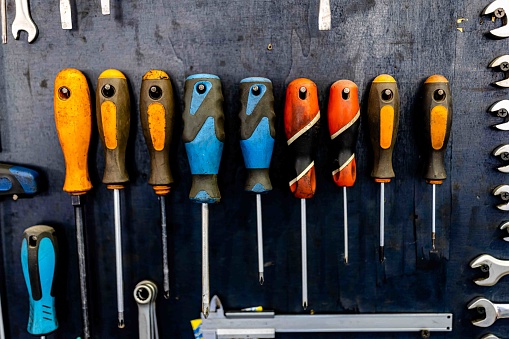 A Close-up View of Screwdrivers in an Auto Mechanic Workshop.