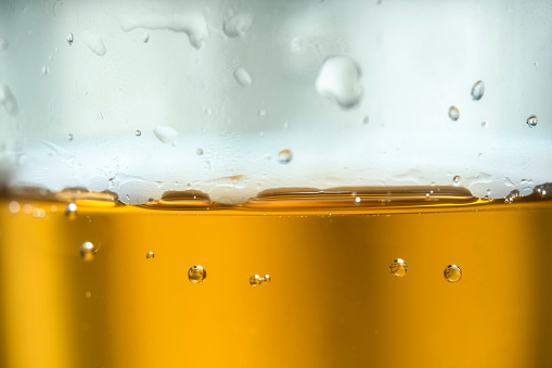 A macro shot of the Bubbles in the water in golden bowl