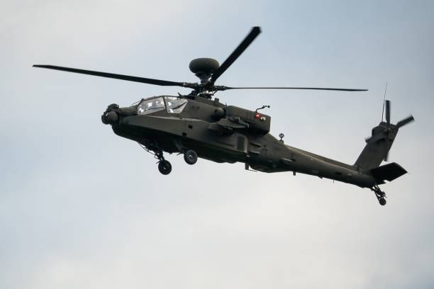 istock Military helicopter landing in flight 1463376366