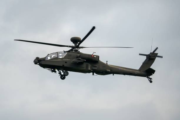 istock Military helicopter landing in flight 1463376370
