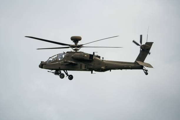 istock Military helicopter landing in flight 1463376374