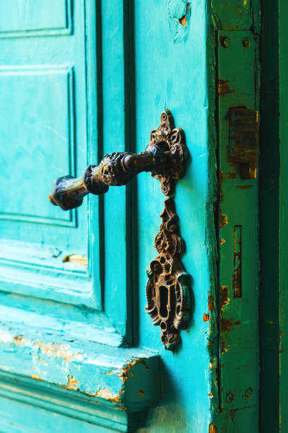 istock Old wooden door with vintage metal handle 1463376471