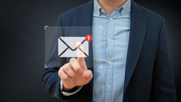 istock Business man touches email on a virtual screen. Global network and data exchange in human hands. Wireless connection technology. 1463377535
