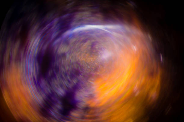 An abstract colorful spinning background in the shape of a globe