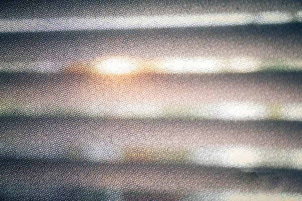 A sunrise through a frosted glass window