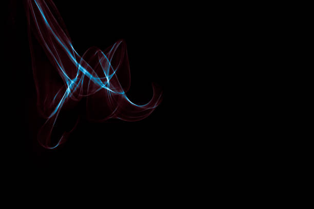 Light painted glowing abstract blue and red curved lines on a black background