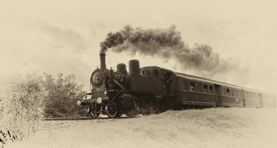Vintage steam train. Sepia toned old photo, daguerreotype.