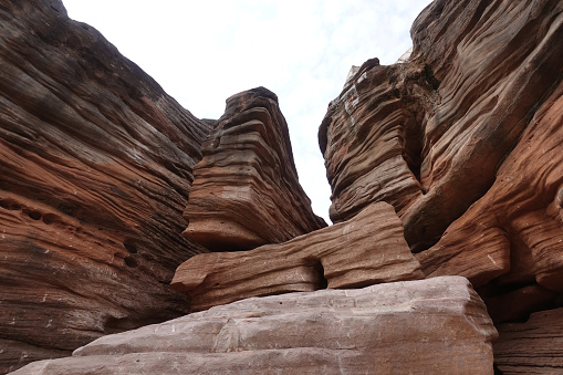 Twisty and curving rocks in the unique and remote White Pocket rock formations in Vermillion Cliffs National Monument in Arizona.
