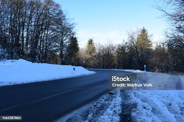 Mountain Road Surrounded By Snow Stock Photo - Download Image Now - Adventure, Asphalt, Blizzard