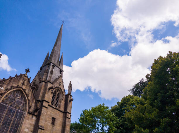 istock Famous medieval gothic church of Saint-Sulpice against a blue cloudy sky 1463389507