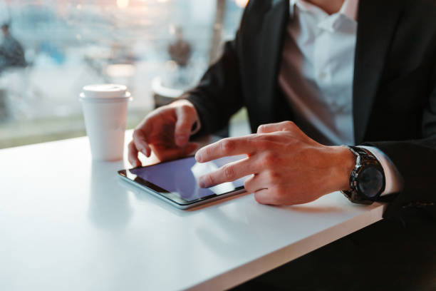 istock Person working with the tablet from the cafe 1463392907