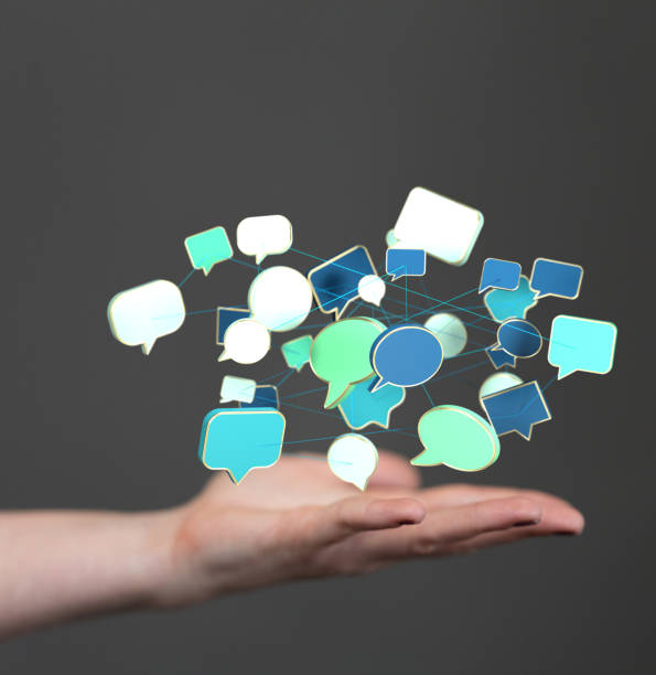 istock Digital concept of chatting and communications with speak bubbles on a hand 1463393204