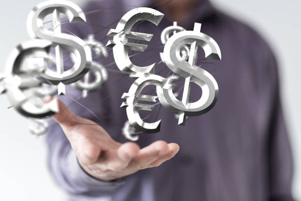 istock Business concept  with floating currency symbols on a hand 1463393264