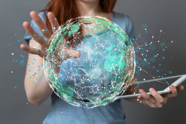istock 3D rendered futuristic globe with users connected to each other held in a person's hand 1463393812