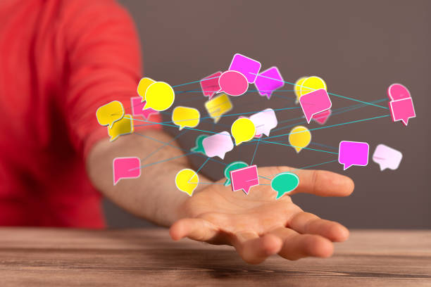 istock 3d rendered chat bubbles on male hand - social media concept 1463393850