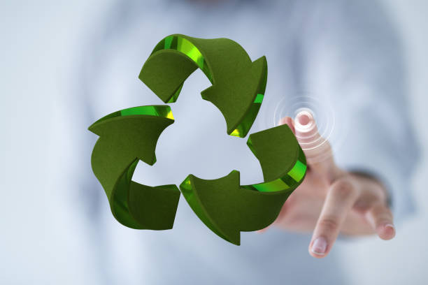istock Hand touching a 3d rendered sign of recycling 1463394005