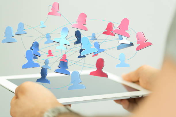istock 3d rendered network of people over the tablet - conference and teamwork concept 1463395118