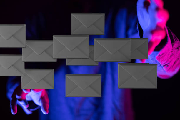 A person presenting the virtual projection of email marketing concept with digital envelopes