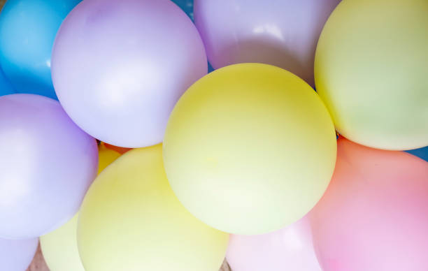 istock Multicolored balloons in the sky, party celebration concept 1463396996