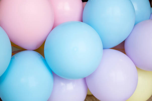 istock Multicolored balloons in the sky, party celebration concept 1463397560