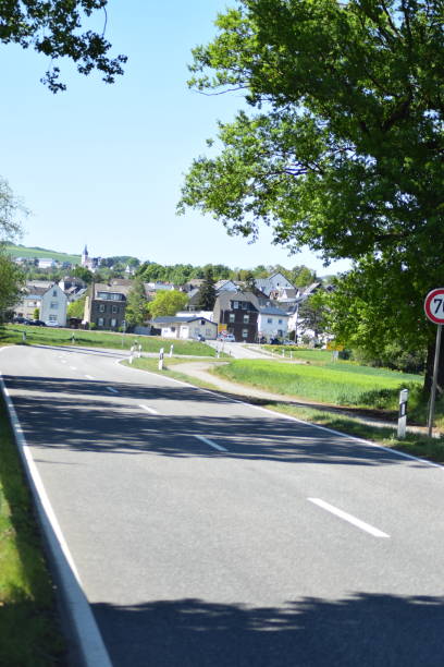 istock country road in summer 1463402056