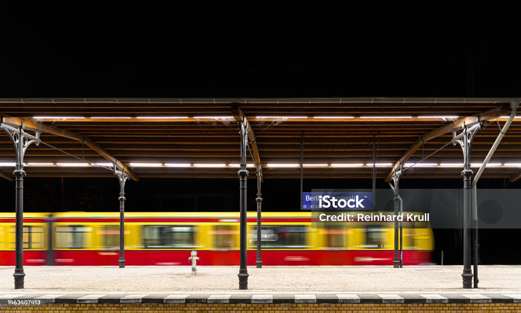 Blurred motion of train at railroad station Speed Stock Photo
