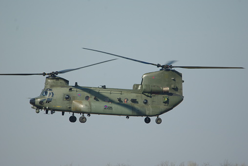 Chinook HC4 modern transport helicopter from royal air force landing at Eindhoven air base, november 2022, the netherlands