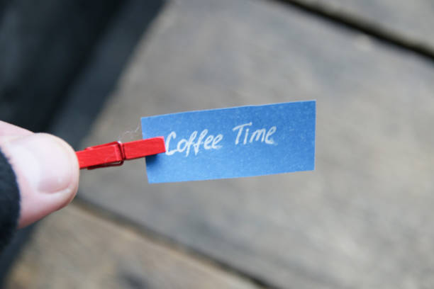 Coffee time inscription on a tag on a wintage background.