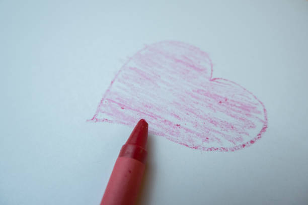 istock selective focus on the love symbol drawn by hand using colored pencils, soft focus 1463418800