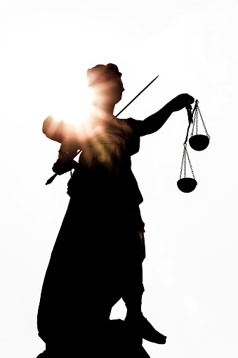 Lady Justitia with sun