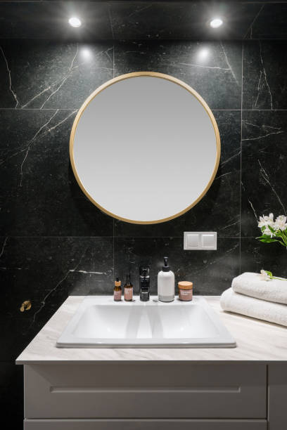 istock modern wash basin, water tap and mirror in stylish bathroom 1463434831