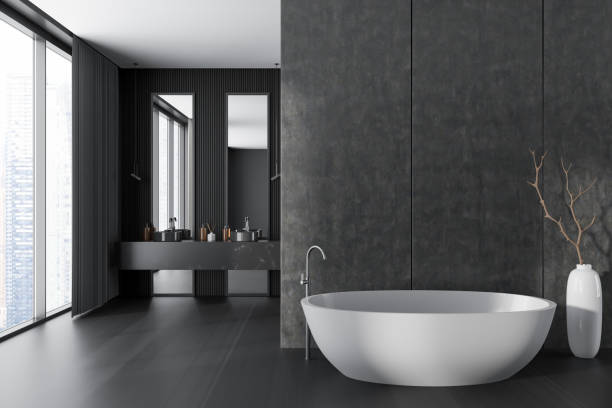 istock Grey bathroom interior with tub and sinks near panoramic window. Empty wall 1463435674