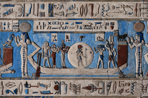 the sun god Ra is traveling across the sky in his solar bark on the astronomical ceiling in Hathor Temple at Dendera. Egypt .