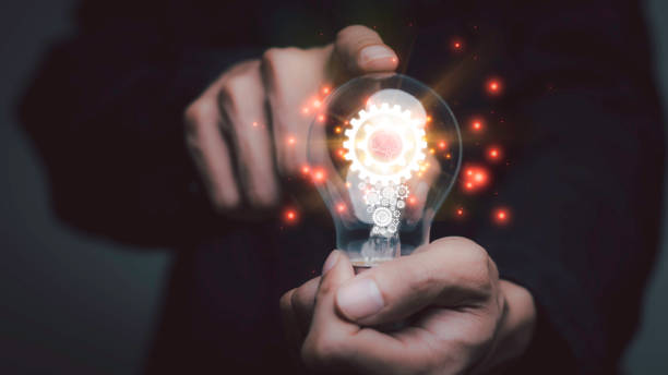 istock Businessman holding a light bulb, Creative new idea. Innovation, brainstorming, solution and inspiration concepts. imagination, creative thinking problem solving... 1463442468