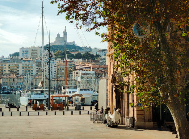 Old port and landmark Basilica in Marseille stock photo