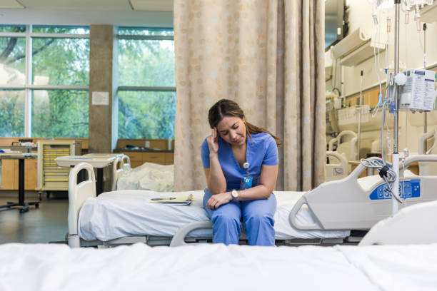 istock Exhausted doctor sitting down 1463443406