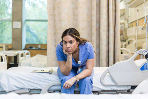istock Upset nurse sitting down 1463443410