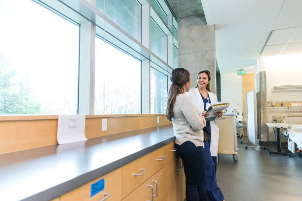 istock Surgeon meets with family member 1463443445