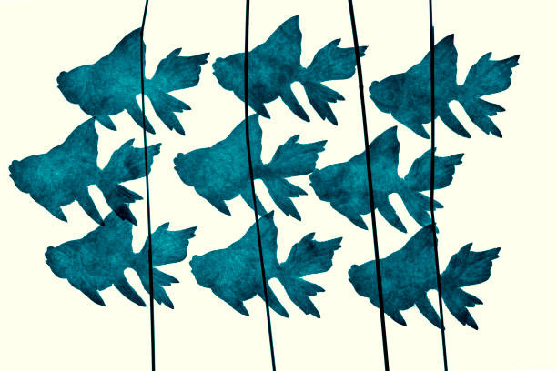 decorative blue fish swim under water  - handmade paper fish from thailand