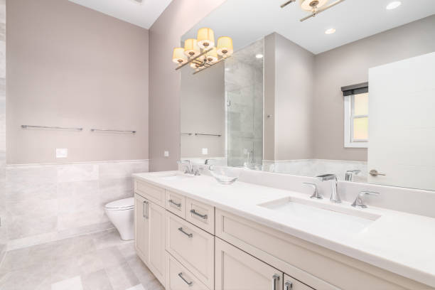 istock A bathroom with neutral colors and marble vanity. 1463452423
